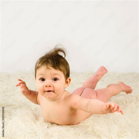 nude baby girls|Top View And Closeup Portrait Of Cute Adorable Naked Baby Girl。